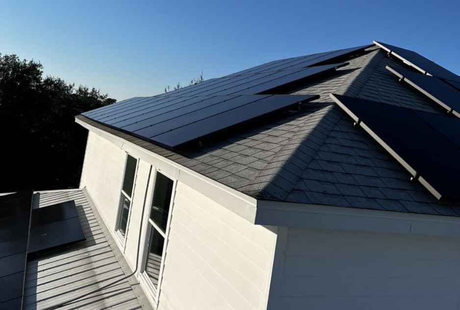 two story residential home with new solar panels installed by st. augustine solar energy company