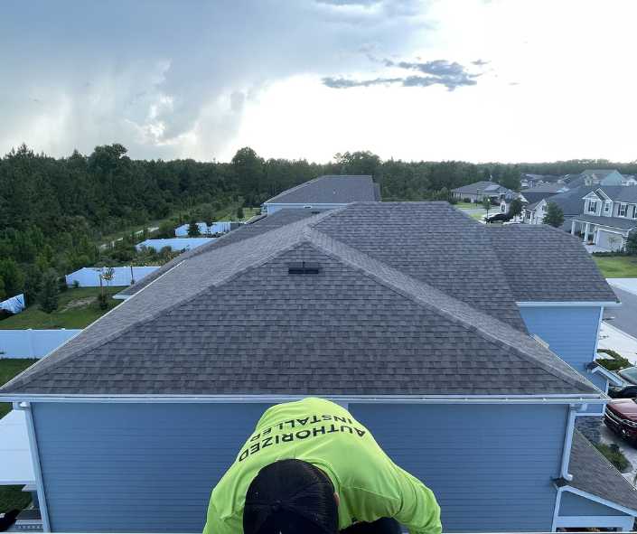 Middleburg FL solar installer on roof of home installing panels for home energy system