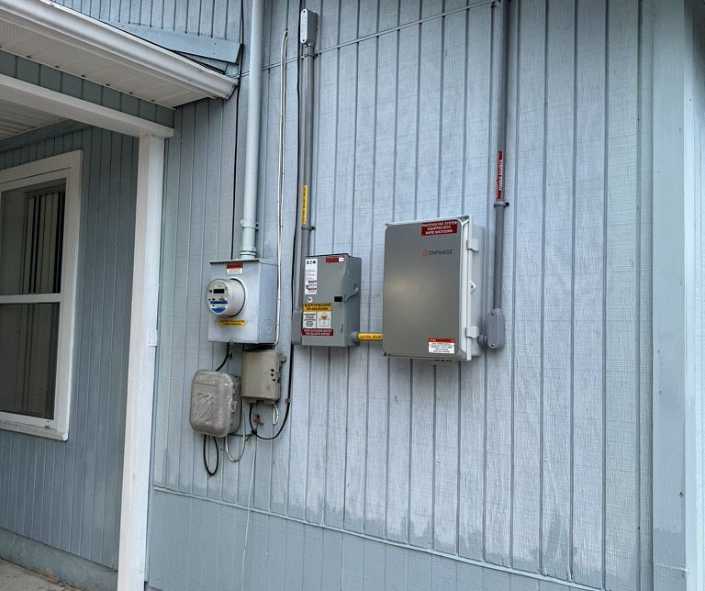 electrical box for home solar panels on side of house