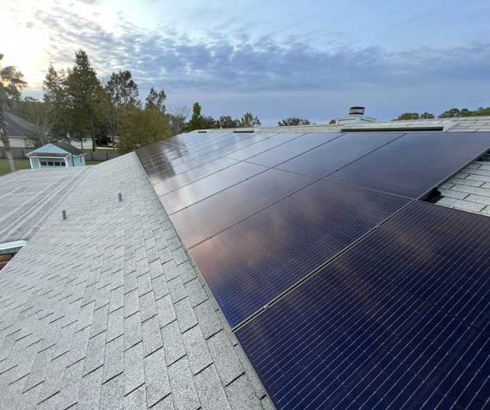 solar panel installers in Middleburg adding panels to roof