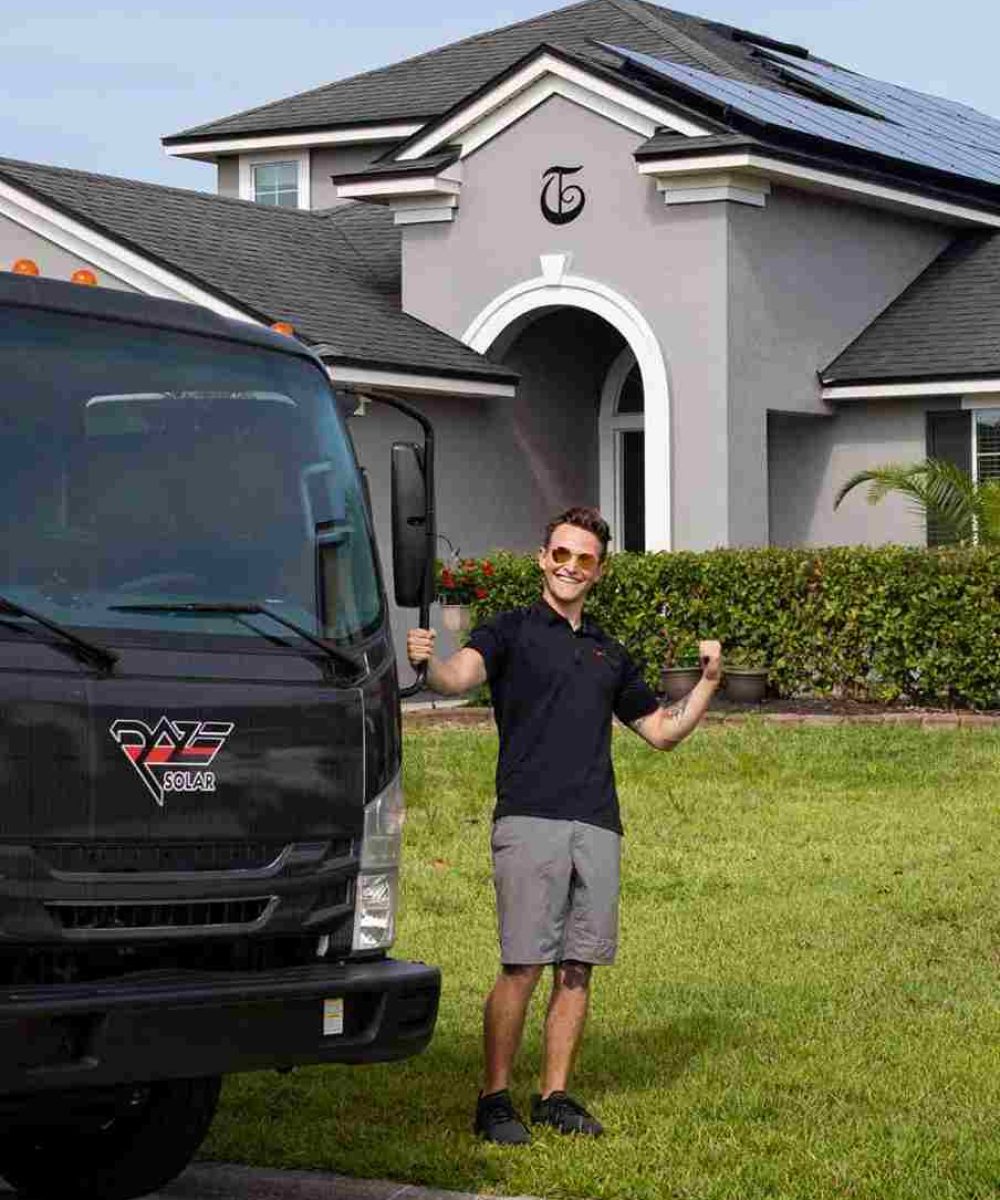 solar energy contractor outside of Florida home showing best rooftop solar panels